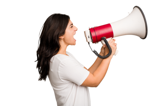 Young Indian woman holding a megaphone isolated