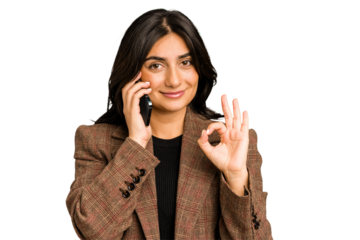 Young indian business woman calling with mobile phone isolated