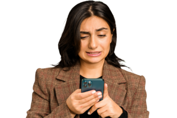 Young Indian business woman using her mobile phone isolated