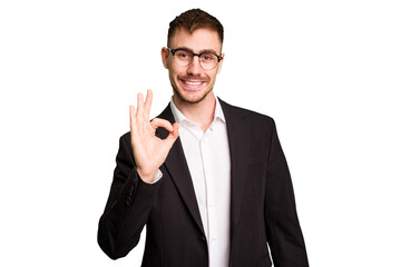 Young caucasian business man cutout isolated cheerful and confident showing ok gesture.