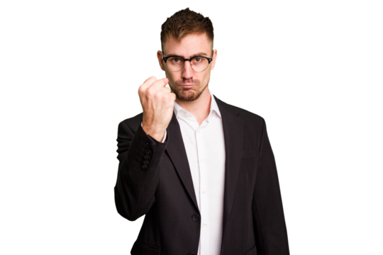 Young caucasian business man cutout isolated showing fist to camera, aggressive facial expression.