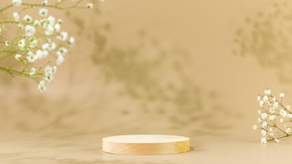 Wooden empty podium on beige background with white flowers and shadows. Round show case for natural...