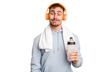 Young caucasian sporty man ready to start his gym day dreaming of achieving goals and purposes