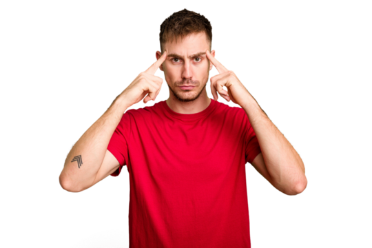 Young caucasian man cut out isolated focused on a task, keeping forefingers pointing head.