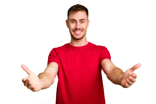 Young caucasian man cut out isolated showing a welcome expression. - Powered by Adobe