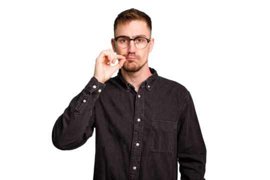 Young caucasian man cut out isolated with fingers on lips keeping a secret.