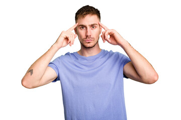 Young caucasian man cut out isolated focused on a task, keeping forefingers pointing head.