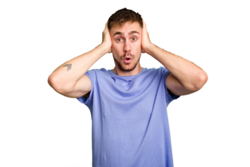 Young caucasian man cut out isolated covering ears with hands trying not to hear too loud sound.