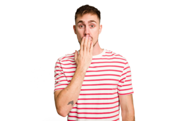 Young caucasian man cut out isolated shocked, covering mouth with hands, anxious to discover something new.