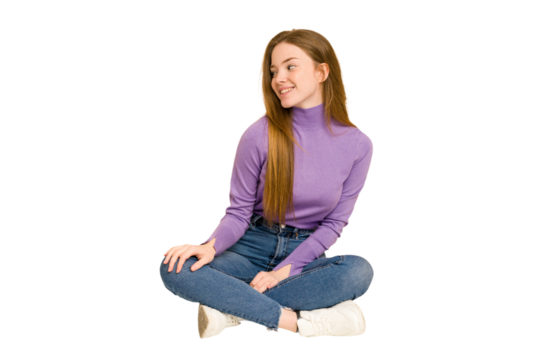 Young redhead woman sitting on the floor cut out isolated sad, serious face, feeling miserable and displeased.