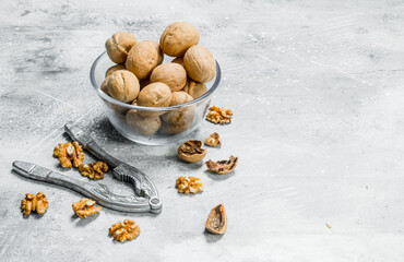 Shelled walnuts with a Nutcracker . .