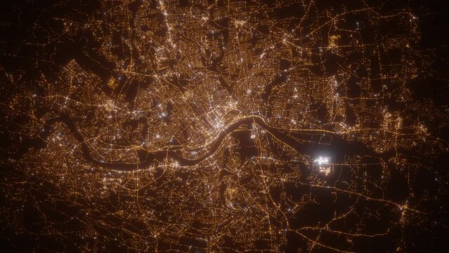 Springfield (Massachusetts, USA) top view at night. Top view on modern city with street lights and glow effect. Camera is zooming in, rotating clockwise. Vertical video. The north is on the left side