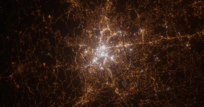 Worcester (Massachusetts, USA) aerial view at night. Top view on modern city with glow effect. Camera is zooming out, rotating counterclockwise