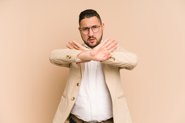 Adult latin business man cut out isolated doing a denial gesture