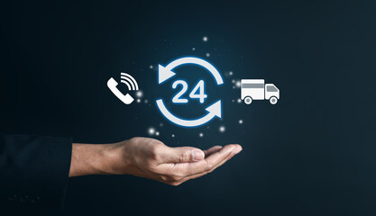 Nonstop service 24 hr of delivery e-commerce concept. businessman hand holding virtual 24/7 with...