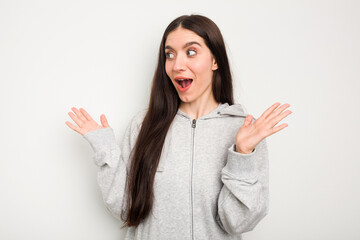 Young caucasian woman isolated on white background joyful laughing a lot. Happiness concept.