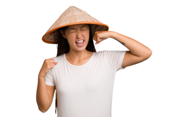 Young asian woman wearing a Vietnamese hat isolated raising fist after a victory, winner concept.