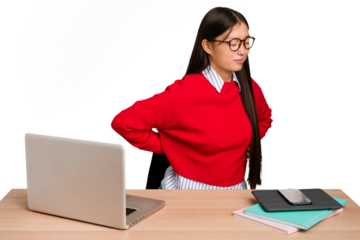 Young student asian woman in a workplace with a laptop isolated suffering a back pain.