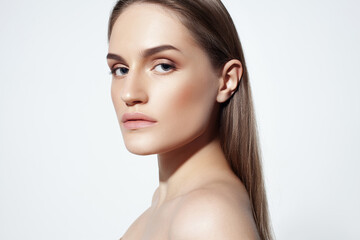 Fototapeta premium Beautiful caucasian girl with perfect skin and natural makeup on white background