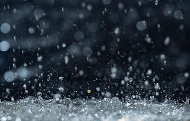 Macro photography of rain on a black background. Abstract background.
