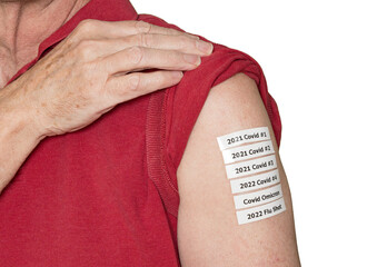 Senior adult man showing all the Covid and flu shots or vaccinations in his shoulder during the pandemic - obrazy, fototapety, plakaty