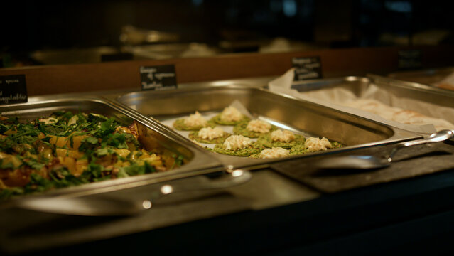 Catering buffet food setting in modern restaurant closeup. Self-service concept