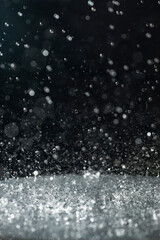 Macro photography of rain on a black background. Abstract background.