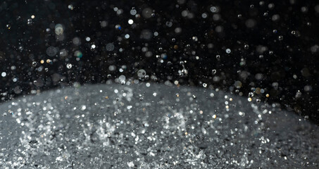 Macro photography of rain on a black background. Abstract background.