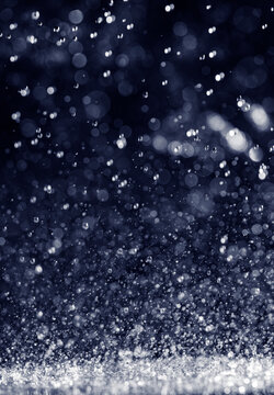 Macro photography of rain on a black background. Abstract background.