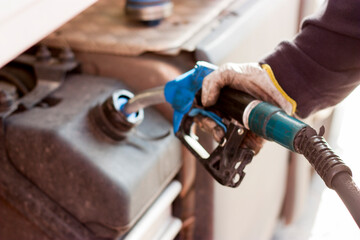 truck driver refueling AdBlue in heavy-duty vehicle, Euro6 standard, reduce CO2 emissions