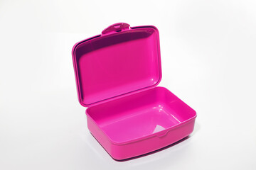 Open plastic lunch box on white background, food container for school