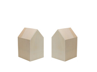 Pair of wooden model house shapes on a plain white background. Housing concept. Copy space. No people.