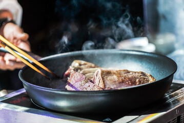 Fototapeta premium chef at work in japanese restaurant