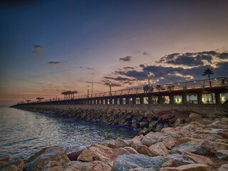 Fototapeta na wymiar l sunset landscape of alicante spain with pier