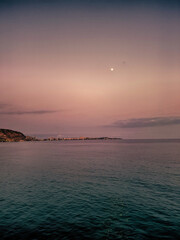 sunset landscape of alicante spain with moon