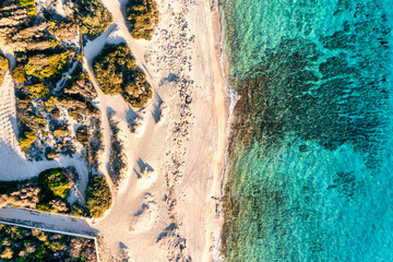 Salento, dune di campomarino di maruggio con il mare blu cristallino - Puglia, Taranto, Italy
