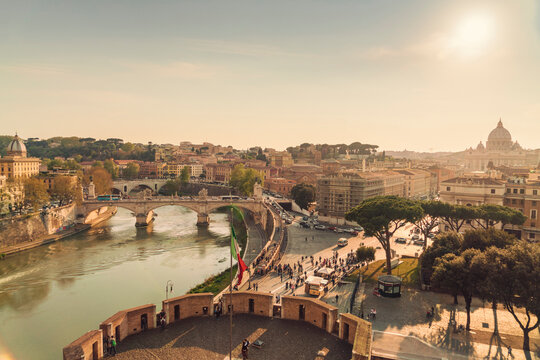 Overview of Tiber with the skyline of Rome and Vatican on the background