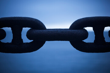 Close-up of large chain links.