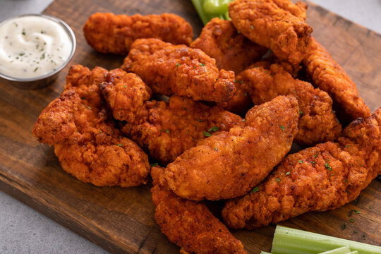 Buffalo chicken fingers served with celery and ranch