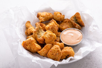 Fried catfish nuggets served with remoulade sauce