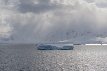 drift ice on cloudy antarctic sea