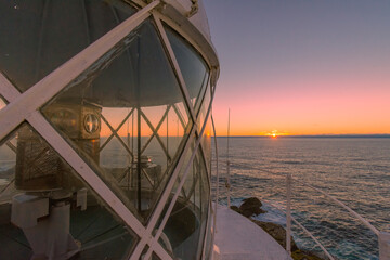 top of a lighthouse tower as the sun rises