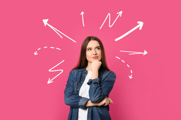 Choice in profession or other areas of life, concept. Making decision, thoughtful young woman surrounded by drawn arrows on pink background - obrazy, fototapety, plakaty