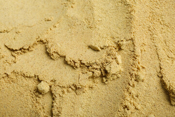Aromatic mustard powder as background, top view