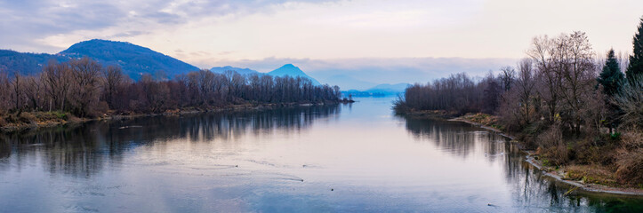 Winter panorama of the end of Toce river (Piedmont, Northern Italy) near the village of Fondotoce (VCO Province), at the point where it flows into the waters of Lake Maggiore.