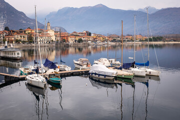 The marina of the village of Feriolo, along the Maggiore Lake shores, full of leisure sailboats during wintertime. Is the 2nd biggest lake in Northern Italy (after Garda), Piedmont Region.