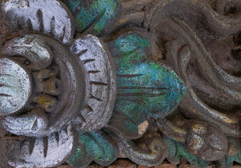 Painted and stained carved wood door in Bali detail texture