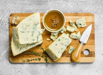 Blue cheese with olive oil.