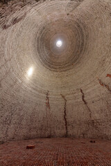 Interior of empty brick kiln in Vinh Long in the Mekong Delta in Vietnam. Vertical format.