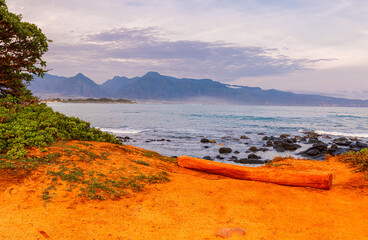 The Red Sand of Spreckelsville Beach and The West Maui Mountains Across Sugar Cove, Maui, Hawaii,...